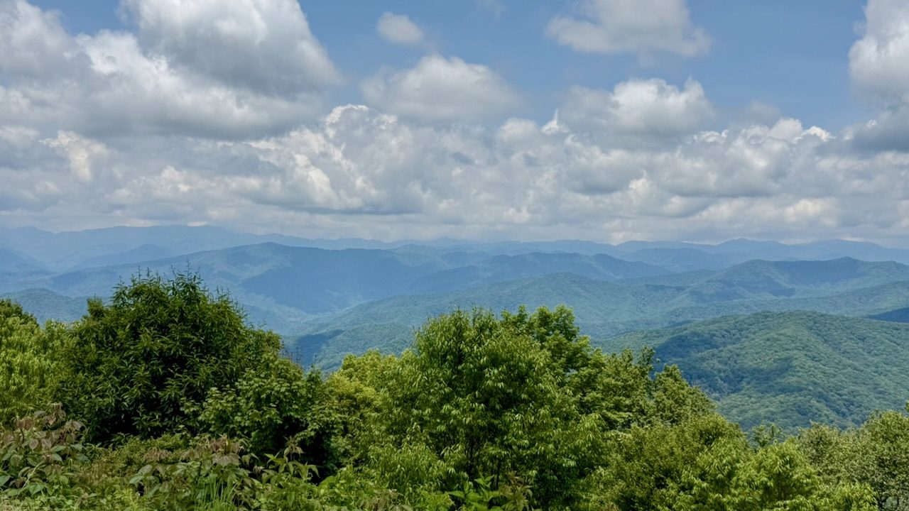 Ridgelines in the Great Smoky Mountains under scattered clouds