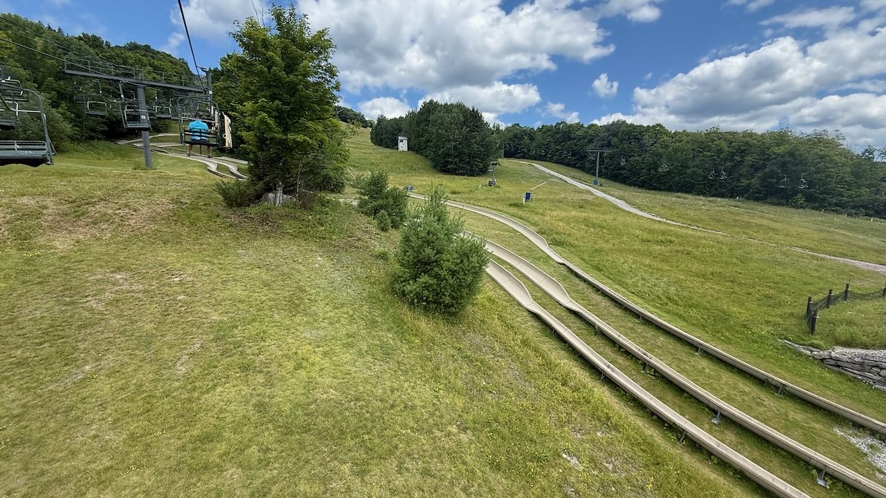 The alpine slide track and chairlift at Bromley Mountain, Vermont